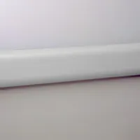PVC crash rail and bumper guard for protecting walls from impact in industrial facilities, warehouses, and loading docks. Silver Gray finish, overall height 2 15/16 inches, length 12 feet. No internal rubber bumper