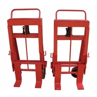 Hydraulic-lift machinery mover with dual-forks for lifting and repositioning heavy equipment. Solid construction, flow-back handle. Overall dimensions: 24 in L x 18 1/2 in W x 47 5/8 in H. Without straps. Used in factories, warehouses, and assembly lines where pallet jacks or cranes are impractical
