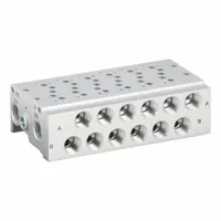 This SMC SY5000 Series bar manifold provides six side ports with Female 1/4 in NPT threads for consolidating pneumatic solenoid valve connections. It operates within a temperature range of 14°F to 122°F and is used in industrial automation systems to simplify air distribution. DIN rail clamps are not included