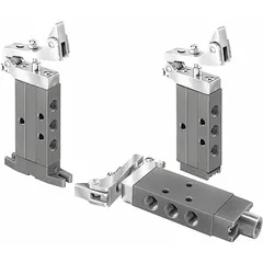 Four-way, two-position spool valve with spring return and one-way tripper actuation. Aluminum body. Directs compressed air flow in pneumatic systems for controlling double-acting cylinders or actuators.