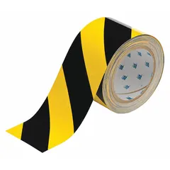 This general purpose floor marking tape is made of polyester with an 8 mil thickness. It features a striped black/yellow pattern and measures 3 inches by 100 feet with no message legend. Commonly used to mark aisles, hazards, and work zones in industrial facilities, the cautionary pattern helps organize traffic flow and improve safety.