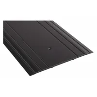 This 3 ft aluminum saddle threshold features a fluted transition surface. It is used to bridge the gap under doors, providing a seal against drafts, moisture, and debris in commercial or industrial doorways