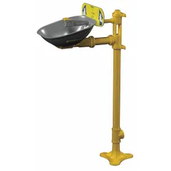 Floor-mount eyewash station providing eyes-only coverage. Features an uncovered stainless steel bowl and push-plate activation. Designed for emergency irrigation in industrial settings where plumbed water supply is available.