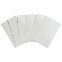 Clear polyester laminate sheet with permanent adhesive, measuring 2 1/2 inches high by 1 1/2 inches wide. Applied over printed labels to protect against abrasion, chemicals, and moisture in industrial environments such as manufacturing, warehousing, and facility maintenance