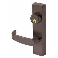 Bronze mechanical exit device trim with lever outside trim and lever exit device style. ADA compliant. For use on commercial doors up to 48 inches wide with push-bar-operated exit devices