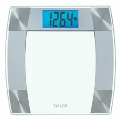 Digital bathroom scale with a 12 1/4 in weighing surface and curved stainless steel accents. Reads in kilograms with 0.1 kg / 0.2 lb readability. Integrated indicator. Suitable for personal weight measurement in home or gym settings.