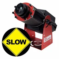 This 300 W LED projector includes a lens and image template for projecting fixed images or logos onto surfaces. It comes with a power supply and is designated as a slow projector. Typical applications include industrial signage, safety warnings, and branding in facilities such as warehouses and manufacturing plants