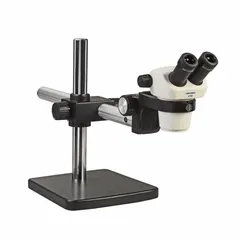 Binocular stereo microscope with 0.7X to 3X zoom range and 30X maximum magnification. Optical field of view is 20 mm. Equipped with a Single Arm Boom stand and a 10 in x 10 in base plate. Suitable for inspection, assembly, and quality control tasks requiring detailed observation and manipulation.