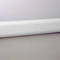 PVC crash rail and bumper guard in Linen White, 2 15/16 in overall height, 12 ft overall length. No internal rubber bumper. Used to protect walls from impact in industrial facilities, warehouses, and loading docks