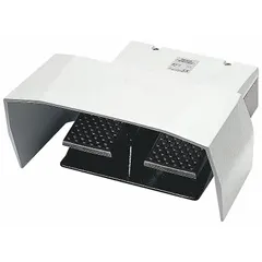 This twin-pedal foot switch from the Siemens 3SE2 series features two pedals with momentary action, each configured as 1 normally open and 1 normally closed contact. It includes a foot guard to prevent accidental activation and is supplied with a 4.92 ft electrical cord. Typical applications include controlling industrial machinery such as presses, welding equipment, or assembly line actuators where two-pedal operation is required.