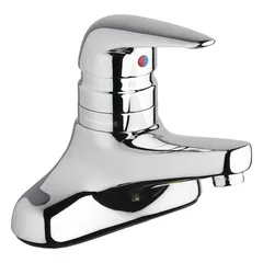This centerset bathroom faucet is constructed from cast brass with a polished chrome finish. It features a low arc spout and includes mounting hardware. The faucet uses NPSM connections and is suitable for lavatory sinks in commercial or residential settings.