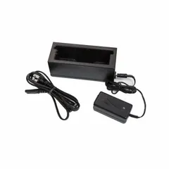 The Sentinel XT Charging Kit is designed to recharge batteries for the Sentinel XL PAPR system, supporting continuous operation of powered air-purifying respirators in industrial environments.