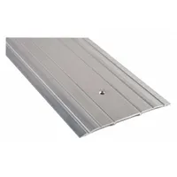 Aluminum saddle threshold, 4 ft long, with a fluted transition surface. Used to seal the gap under doors and provide a smooth transition between different flooring materials or heights in commercial and industrial doorways