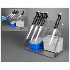 Benchtop pipette holder constructed from clear PETG with rubber components. Overall height 9-3/4 in, length 7-3/8 in. Designed for organized storage of pipettes in laboratory settings.