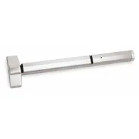 This rim-type exit device features a stainless steel touchbar for doors up to 36 inches wide. It is designed for emergency egress in commercial buildings and does not include outside trim. Not ligature-resistant