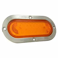 This GROTE turn signal light features an amber oval LED lens with a bracket mount for permanent installation. It uses a male pin electrical connection and measures 3 5/8 inches overall height. Compliant with FMVSS 108 standards, it is suitable for use on commercial vehicles, trailers, and heavy equipment to indicate turning or stopping