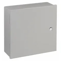 This NEMA 1 steel enclosure measures 24 x 20 x 7 inches and features a hinged solid cover with a painted finish. It is designed for indoor use to house electrical components, wiring, and controls, providing protection against dust and accidental contact. No knockouts are included.