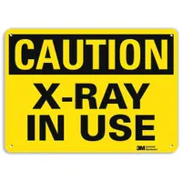This 10 x 14 in plastic sign features mounting holes for secure wall attachment. It displays 'X-Ray In Use' to indicate areas where X-ray equipment is operating. The sign is 0.055 in thick, non-retroreflective, and non-glow-in-the-dark. Suitable for medical, dental, or industrial settings to restrict access and promote safety