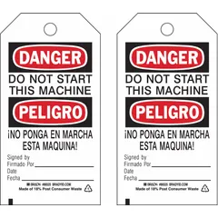 Black cable-tie-attached tags with red and white bilingual danger warnings and fields for signature and date. Supplied as a 10-pack. Used for lockout/tagout identification on industrial equipment to prevent accidental startup during maintenance.
