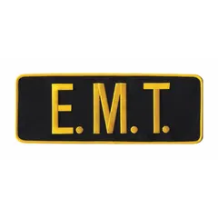 Embroidered insignia with E. M. T. designation. Measures 11 in x 4 in, black with gold lettering, made of plastic, and attaches by sewing. Used to identify emergency medical technicians on uniforms, bags, or gear.