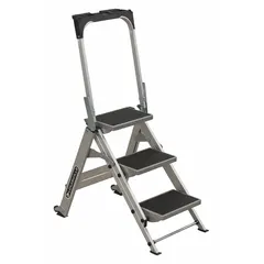 This folding step stool is constructed from aluminum with a silver finish and features three steps. It has an overall height of 3.6 ft and a load capacity of 300 lb. Suitable for providing stable access to elevated areas in industrial, warehouse, and maintenance settings.