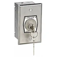 Momentary contact keyswitch for outdoor flush-mount installation. Provides open-close control functions for gate operators. Suitable for commercial or residential applications requiring key-operated access