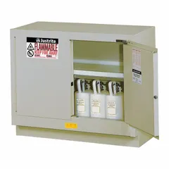 Stationary steel cabinet for storing flammable liquids. Self-closing doors enhance safety. Compatible with fume hoods for vapor containment. Silver finish. Dimensions: 35 3/4 in height, 4 ft width.