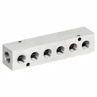 This PNEUMADYNE block manifold features a rectangular stainless steel body with 3/8 in NPT x NPT connections. It is used to distribute compressed air or fluids to multiple points in pneumatic or hydraulic systems. The stainless steel construction provides corrosion resistance for demanding environments