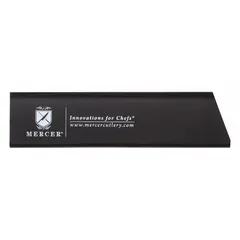 Black polystyrene knife guard for single blade storage and transport. Overall length 4 inches, width 1 inch. Protects blades from damage and reduces risk of cuts during handling or storage.