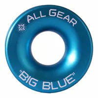 This low friction rigging ring is constructed from blue aluminum and measures 5 inches in overall length and 2 inches in overall width. It is used in industrial rigging and lifting applications to reduce friction and enable smooth load movement, commonly employed in manufacturing, construction, and material handling for controlled positioning of heavy loads