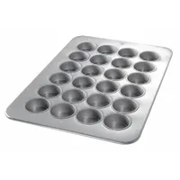 This muffin pan is made of aluminized steel with a silver finish, featuring 24 slots for baking standard or Texas-style muffins. The pan measures 17 7/8 inches in overall width and is suitable for commercial or high-volume kitchen use. It is not NSF certified