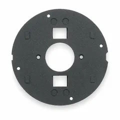 Round floor subplate made of cast aluminum with a smooth black finish. Designed for use with compatible floor boxes to provide a flush-mount surface for electrical or data connections in commercial and industrial flooring applications.