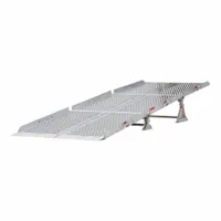 This punched-type yard ramp provides a portable loading solution for bridging the gap between a loading dock and ground level. With a 7 ft overall width, 4 in side rail height, and 15 in minimum service height, it allows forklifts to load or unload trailers efficiently in warehouses and industrial facilities