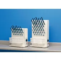 Benchtop electric drying rack constructed of ABS plastic. Includes two baskets and 5-inch pegs. Overall dimensions: 16 3/4 in length, 7 1/2 in width. Used in laboratory and industrial settings for drying glassware, instruments, and small parts