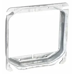 Steel plaster ring with raised cover design. Raised height of 3/4 in, overall dimensions 4 in length by 4 in width. Used to provide a raised mounting surface for switches and outlets, aligning devices flush with finished plaster or drywall.