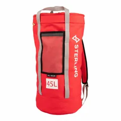 Red polyester rope bag with tie-off feature for securing lines. Overall height 23 1/2 in, diameter 12 in. Used for organized rope storage and access in work-at-height and rigging applications.