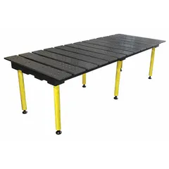 Fixed-height modular welding table with a 5/8 in hole pattern for fixturing and clamping. Nitrided surface resists weld spatter and wear. Supports up to 4,400 lb for heavy fabrication and assembly tasks.