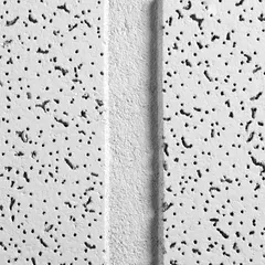 Mineral fiber ceiling tile from the Cortega series, white finish, with Angled Tegular edge for 15/16 in grid systems. Fire resistive with high recycled content and standard light reflectance. Suitable for general purpose use in commercial interiors.