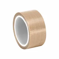 This PTFE slick surface tape features a silicone adhesive and is rated for continuous use up to 500°F. The brown tape is 2 inches wide, 5 yards long, and 5.3 mils thick. It is suited for high-temperature masking, sealing, and release applications in industrial processes such as powder coating, heat sealing, and oven line protection