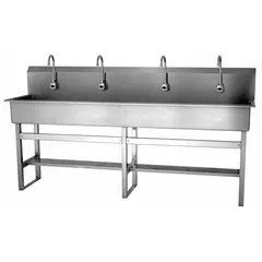 Four-station freestanding wash station with sensor-operated faucets, battery powered. Constructed of 16-gauge material with 77-inch bowl length, 8-inch bowl depth, and 2 gpm flow rate. Suitable for high-traffic commercial or industrial settings requiring hands-free handwashing. Side splash not included.
