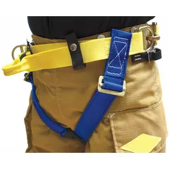 This NFPA Class II harness is constructed with blue nylon webbing and steel hardware. It features pass-through leg strap buckles and no back, front, or side D-rings. Designed for fall arrest and rescue in industrial and fire-service applications, it meets NFPA 1893 standards.