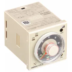 Panel-mounted time delay relay with surface mounting. Accepts 100 to 240V AC or 100 to 125V DC input. Used for timing control in industrial automation, such as delaying motor starts or sequencing conveyors.