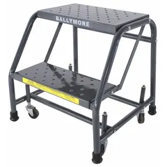 This rolling step stool features a steel frame with a gray finish and four swivel casters for easy mobility. With two steps and a 450 lb load capacity, it provides a stable elevated platform for reaching items up to 2.4 ft high. Suitable for use in warehouses, retail, and industrial settings.