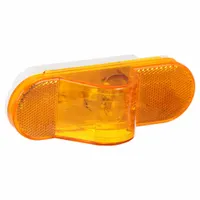 Amber oval turn signal light with incandescent lighting, 2 1/4 in overall height. Features grommet mount for permanent installation and female pin electrical connection. Complies with FMVSS 108 standards. Used on commercial vehicles and trailers for side-marker or turn signal indication
