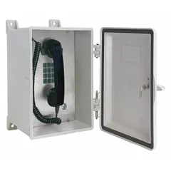 Surface-mount rugged telephone with keypad and PSTN connectivity. Hytrel and plastic gray housing with spring door kit. Water resistant for outdoor use in hazardous areas such as oil and gas or chemical plants.