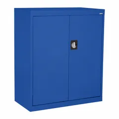 This stationary commercial shelf cabinet is constructed from welded steel with a powder-coated blue finish. It includes a recessed door handle with three-point locking and two adjustable shelves. Suitable for secure storage in industrial and commercial settings.