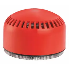 Outdoor electronic sounder producing a siren tone for audible warning. Operates on 120 to 240V AC or 12 to 24V AC/DC. Red housing suitable for industrial plants, warehouses, and perimeter safety zones.