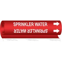 Red wrap-around pipe marker with white legend reading 'Sprinkler Water' and directional arrows. Fits pipe outer diameters from 1/2 to 1-3/8 inches. Used to identify sprinkler water lines in piping systems for safety and maintenance
