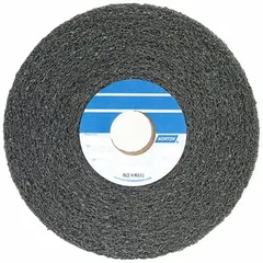 This NORTON Bear-Tex Clean & Finish convolute wheel is a final finishing wheel for stainless steel and nickel alloys. It measures 6 inches in diameter by 4 inches in width with a 1-inch arbor and is made of silicon carbide in a medium, soft (4), soft grade. Used for deburring, blending, and polishing in industrial fabrication and maintenance applications.