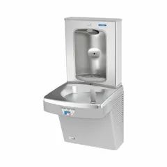 This on-wall single drinking fountain with bottle filler features a stainless steel housing with a silver finish. It provides a chilling capacity of 8 gph at 50°F and includes a touchless sensor for hands-free operation. Top panel access facilitates filter maintenance. Suitable for commercial and institutional settings requiring chilled drinking water.